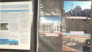 A scrapbook is open to two pages. On the left is a cruise ship's daily program, and on the right are mounted three photographs of beautiful buildings in Italy with hand-written captions.