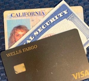 A California ID card, a Social Security card, and a Wells Fargo Visa card.