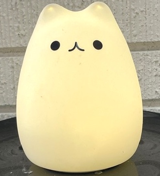 Memory Kitty night light - soft white glow. This is how Peggy experienced Memory Kitty.