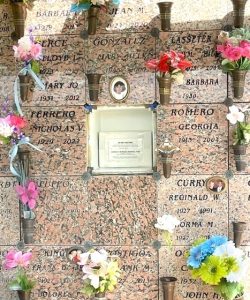 A wall of funerery niches at a Catholic cemetery.