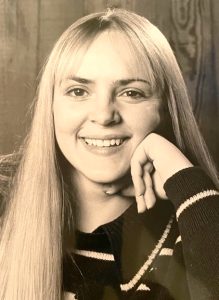 Peggy's high school graduation portrait in 1977.