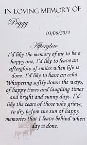 The back of a Catholic prayer card.
